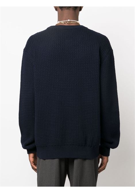 maglia nera in lana vergine a intarsio con logo DG rosso DOLCE & GABBANA | GXM96T-JCVA5S9000
